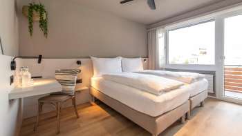 Accogliente camera doppia all'Hotel Giessen