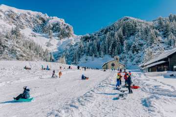 Divertimento in slitta a Malbun - divertimento invernale per famiglie in Liechtenstein