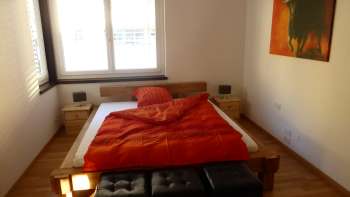 Camera da letto dell'attico