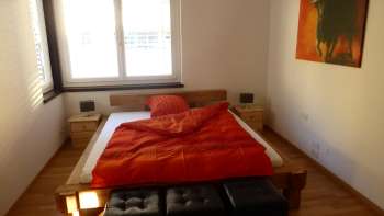 Camera da letto dell'attico
