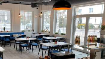 Sala ristorante arredata in stile moderno del «Gsund & munter»